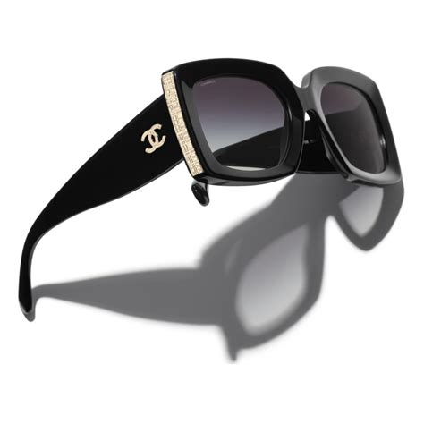 chanel occhiali sole nero lente oro|Chanel occhiali.